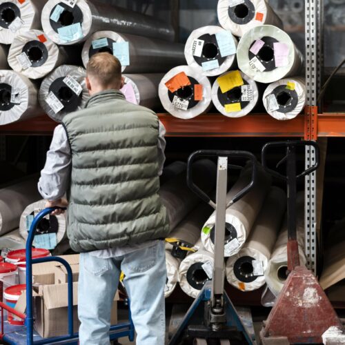 Image of rolls of carpet in storage