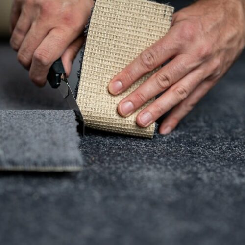 Image of cutting a carpet